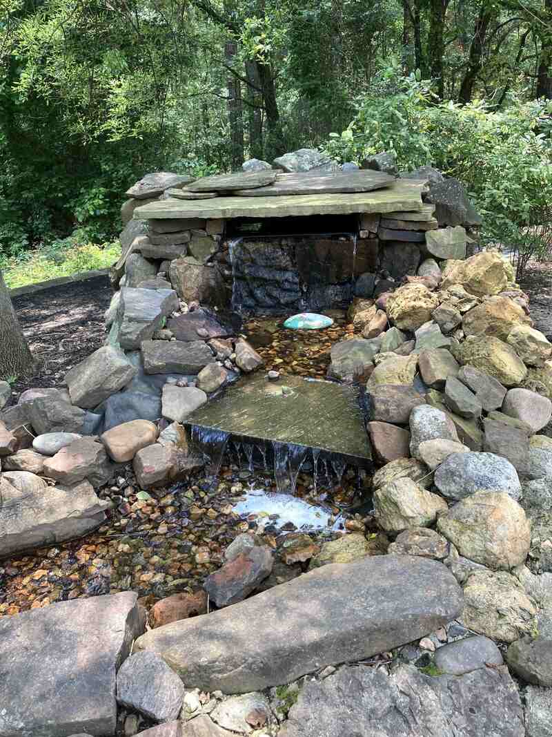 peaceful-reflections photo of a peaceful rocky water feature